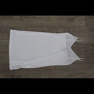 White strappy mini dress with small slit on side